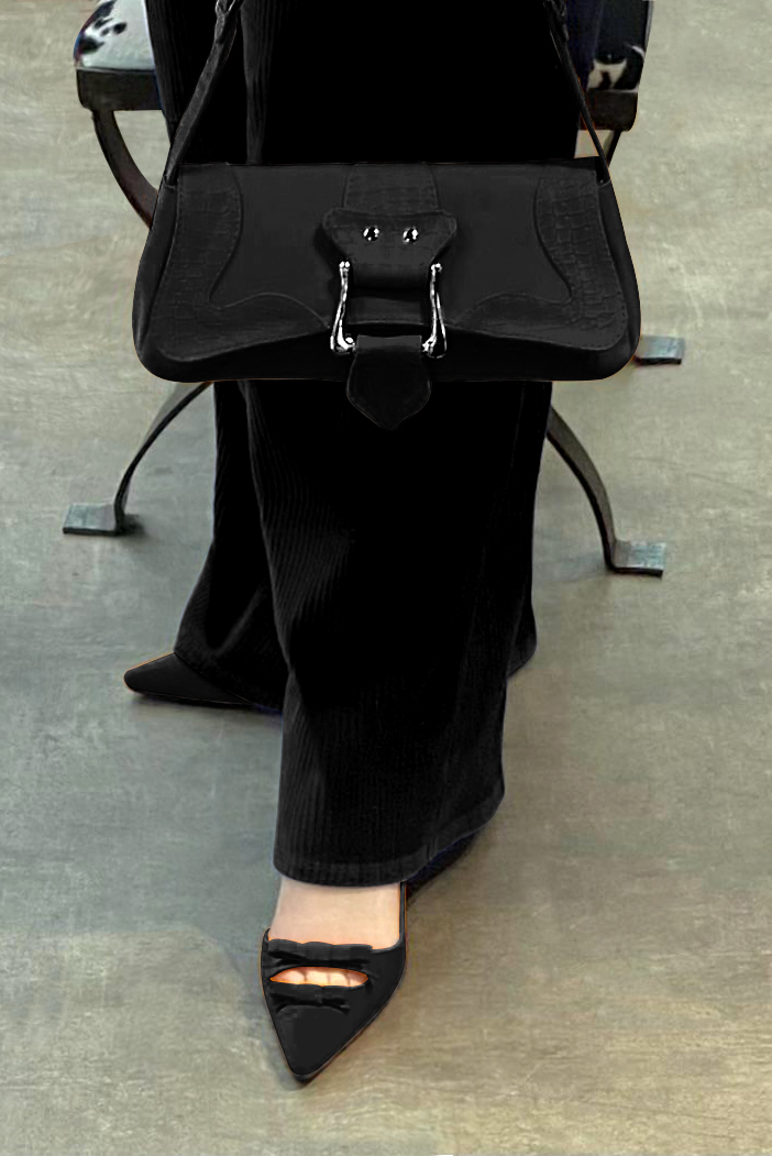 Matt black women's open back shoes, with a knot. Pointed toe. Flat kitten heels. Worn view - Florence KOOIJMAN